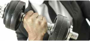 man holding barbell